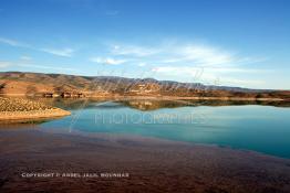 Image du Maroc Professionnelle de  Le barrage Laghrasse "dit barrage Hassan II", il se situe à 50 km au sud est de Taourirte au nord du Maroc, Samedi 10 Février 2006, ce barrage fournit en eau potable  le barrage Mohammed V qui sert de lien pour Machraa Hammadi,  ce dernier permet l'approvisionnement des centre de Taourirte et El Aïoun Sidi Mellouk. (Photo / Abdeljalil Bounhar)